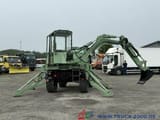 1996 Unimog AT16 wheel excavator rear view