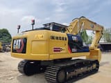 Caterpillar 320GC crawler excavator, rear three-quarter view
