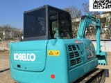 2022 Kobelco SK60 mini excavator, rear three-quarter view