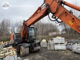 2014 Hitachi ZX140W-5 wheel excavator, front three-quarter view