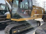 2023 Caterpillar 320GC crawler excavator, side view