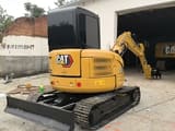 2022 Caterpillar 303.5E mini excavator rear three-quarter view