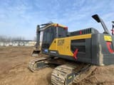2023 Volvo EC210D crawler excavator, rear three-quarter view