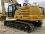 2023 Caterpillar 330 crawler excavator, rear three-quarter view