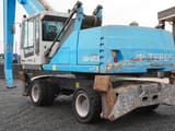 2017 Fuchs MHL340 wheel excavator, rear three-quarter view