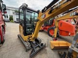 2022 Caterpillar 302-05 mini excavator, front three-quarter view
