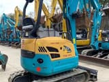 2021 Kubota U17 mini excavator, rear three-quarter view