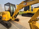 2021 Caterpillar 303.5E mini excavator, side view