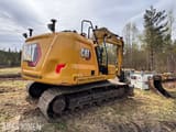 2022 Caterpillar 313 Next Gen excavator, rear three-quarter view