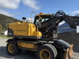 2009 Volvo EW140C wheel excavator, side view