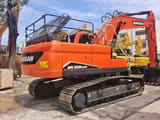 2024 Doosan DX225LCA crawler excavator, rear three-quarter view