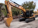 2024 Caterpillar 330D2L crawler excavator, front three-quarter view
