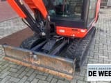 2022 Kubota KX027-4 mini excavator front view with blade