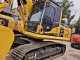 2024 Komatsu PC210LC-8 crawler excavator, side view