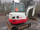 2018 Takeuchi TB230 mini excavator, rear three-quarter view