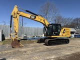 2018 Caterpillar 320-07A crawler excavator, side view