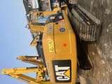 2016 Caterpillar 320D crawler excavator, rear three-quarter view