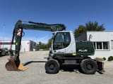 2009 New Holland MH-PLUS wheel excavator side view