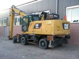 2015 Caterpillar MH3024 material handler, rear three-quarter view