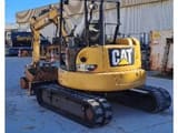2018 Caterpillar 305.5E2 crawler excavator, rear three-quarter view