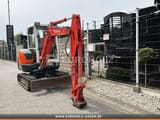 2010 Kubota KX91-2 S2 mini excavator, front three-quarter view