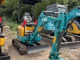 2024 Kubota U15 mini excavator, front three-quarter view