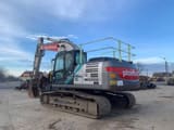 2018 Kobelco SK210HLC-10 crawler excavator rear three-quarter view