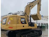 2023 Caterpillar 330GC crawler excavator, rear three-quarter view
