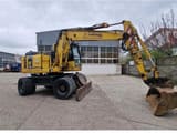 Komatsu PW148-8 wheel excavator, side profile view