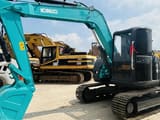 Kobelco SK75 crawler excavator, side view