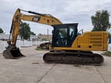 2018 Caterpillar 323GC crawler excavator, side view