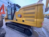 2024 Caterpillar 320GC crawler excavator, rear three-quarter view