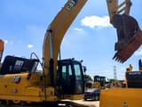 2023 Caterpillar 320GC crawler excavator, side view