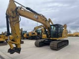 2022 Caterpillar 323 crawler excavator, front three-quarter view