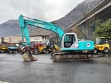 2000 Kobelco SK210NLC-6 crawler excavator, side view