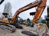 Case CX240B crawler excavator, side view