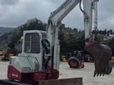 2007 Takeuchi TB153 mini excavator, side view