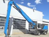 2015 Fuchs MHL360 F material handler, side profile view