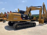 2021 Caterpillar 323D2 L crawler excavator, rear three-quarter view