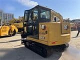 2024 Caterpillar 305.5E2 mini excavator, rear three-quarter view