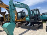 2024 Kobelco SK75 mini excavator, front three-quarter view