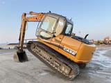 2006 CASE CX130 crawler excavator, rear three-quarter view