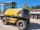 1999 Volvo EW160 wheel excavator, side view