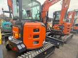 2025 Hitachi ZX38U-6 mini excavator, rear three-quarter view