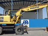 2016 Komatsu PW180-7EO wheel excavator, side profile view
