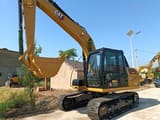 2023 Caterpillar 313 GC crawler excavator, side profile view