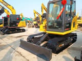 2025 Komatsu PC70 crawler excavator, front three-quarter view