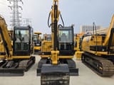 2024 Caterpillar 306E2 mini excavator, front view