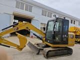 Caterpillar 305.5E2 mini excavator, side profile view