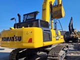 2023 Komatsu PC450 crawler excavator, rear three-quarter view